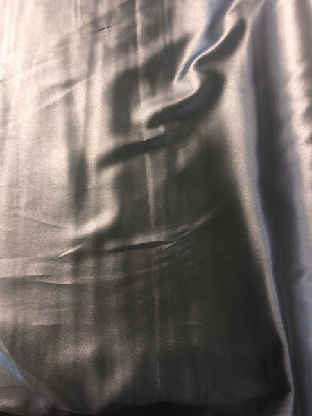 Black Leather Look PVC. 180g/m2, 100% Polyester. Roll Size: 3m