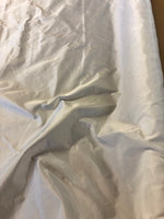 Pale Ivory Silk Like Heavy Taffeta With Some Sheen. 160g/m2, 100% Polyester. Roll Size: 4.3m