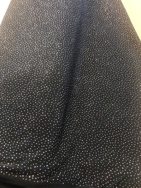 Irridescent Glitter on Black Stretch. 180g/m2, 95%Polyester 5% Elastane. Roll Size: 7m