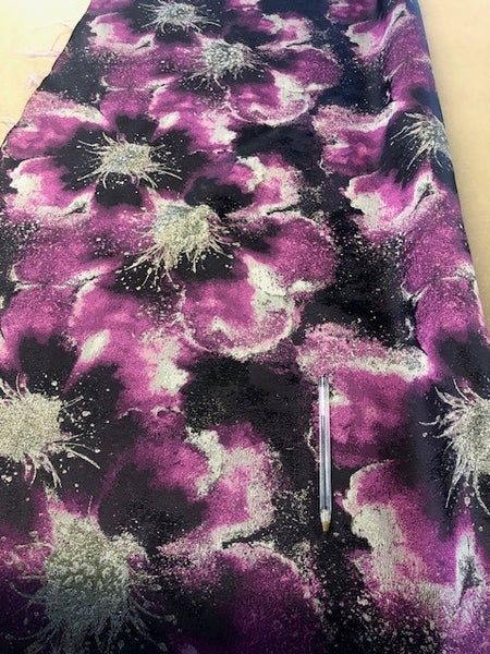 Purple/Black Floral Jacquard with Gold Lurex. 140g/m2, 90% Polyester 10% Lurex. Roll Size: 5m