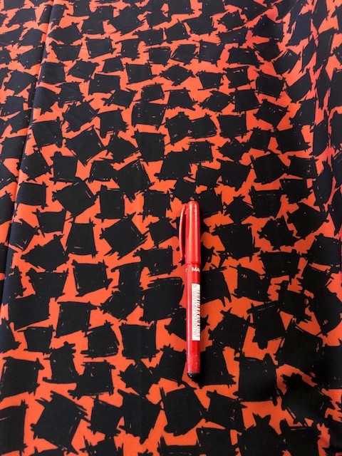 Orange/Black Abstract Block Print on Crepe. 180g/m2, 100% Polyester. Roll Size: 5.5m