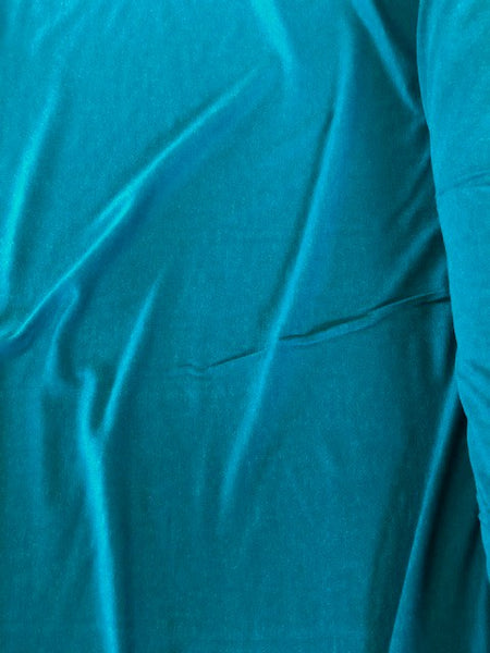 Teal Wool Mix Jersey, 170cm Wide. 190g/m2, 20% Wool 72% Viscose 8% Elastane. Roll Size: 1.9m.