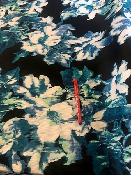 Turquoise on Black Floral Yoryu Chiffon. 80g/m2, 100% Polyester. Roll Size: 6.7m