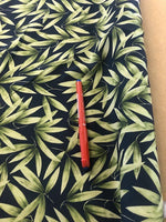 Green on Black Leaf Print on Crepe de Chine. 100g/m2, 100% Polyester. Roll Size: 2m