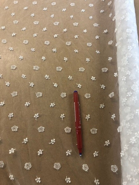 Ivory Ditzy Embroidery on Tulle. 80g/m2, 100% Polyamide. Roll Size: 1.7m