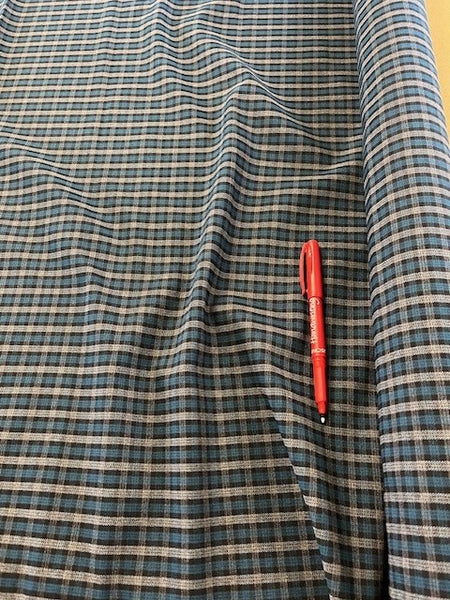 Teal/Grey Suiting Weight With One Way Stretch. 180g/m2, 60% Viscose 25% Wool 5% Elastane. Roll Size: 1.4m