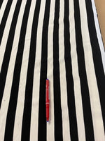 Black/White 2cm Knitted Stripe. 260g/m2, 73% Polyester 22% Viscose 5% Elastane. Roll Size: 6m