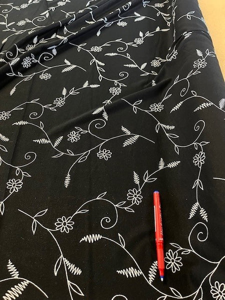 White on Black Trailing Leaf Print on Jersey. 160g/m2, 100% Viscose. Roll Size: 4m
