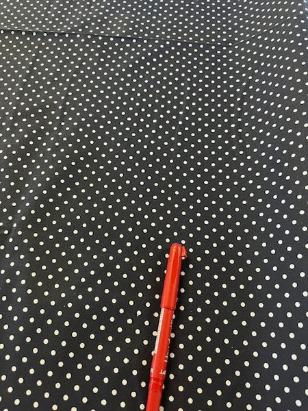 White Spot on Navy Poly/Cotton. 110g/m2, 65% Polyester 35% Cotton. Roll Size: 2m