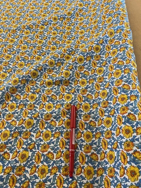 Orange/Blue Floral on Cotton. 110g/m2, 100% Cotton. Roll Size: 3.3m