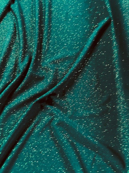 Green Glitter on Jersey. 220g/m2, 95%Polyester 5% Elastane. Roll Size: 2m