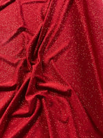 Red Glitter on Jersey. 220g/m2, 95% Polyester 5% Elastane. Roll Size: 5m
