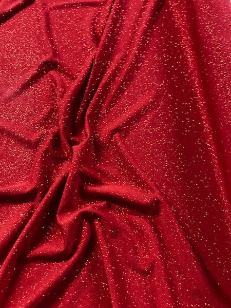 Red Glitter on Jersey. 220g/m2, 95% Polyester 5% Elastane. Roll Size: 5m