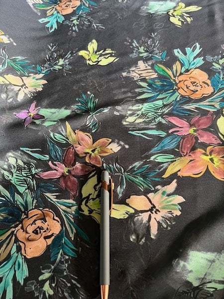Multi Flower Bunches on Dark Navy Crepe De Chine. 110g/m2, 100% Polyester. Roll Size: 3.2m