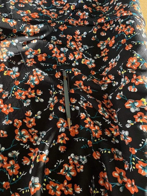 Red Trailing Blossom on Viscose. 110g/m2, 100% Viscose. Roll Size: 8m