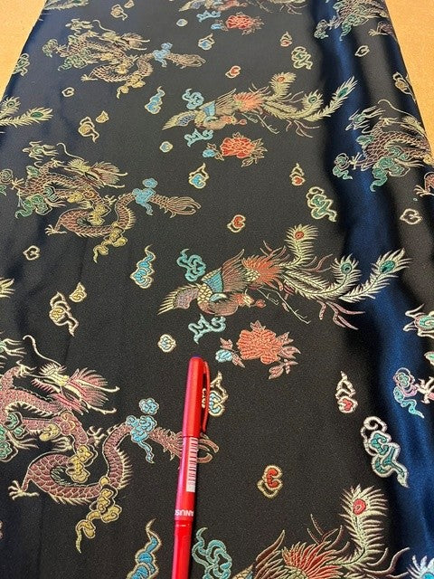 Gold on Black Dragon Jacquard, 100% Polyester, 140g/m2, 140cm Wide. Roll Size: 1.2m