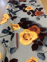 Yellow/Orange Roses on Sage Green Crepe Stretch. 180g/m2. Roll Size - 4.4m