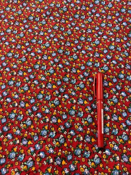 Blue on Red Ditzy on Cotton Poplin, 90cm Wide. 100g/m2. Roll Size - 5m