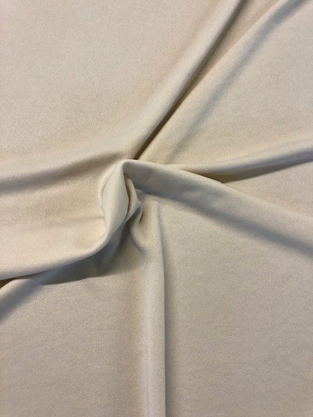 Cream Single Jersey.  100% Polyester.  165cm.  Roll Size 3m.