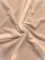 Ivory Jersey. 88% Viscose 10% Nylon 2% Elastane. 155cm.  Roll Size 5.5m.