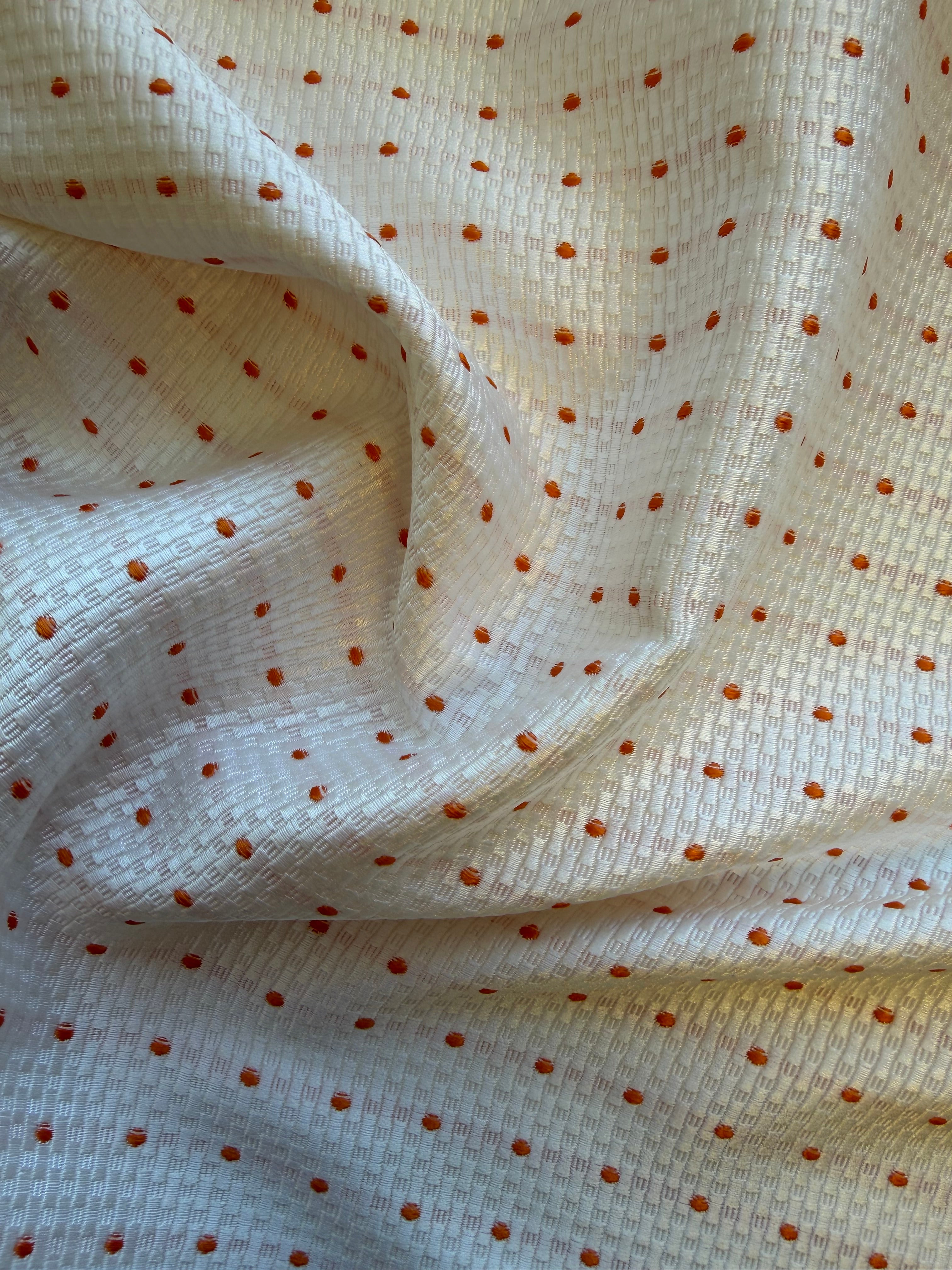 White Textured Woven Fabric with Orange Spots – 130 cm Wide