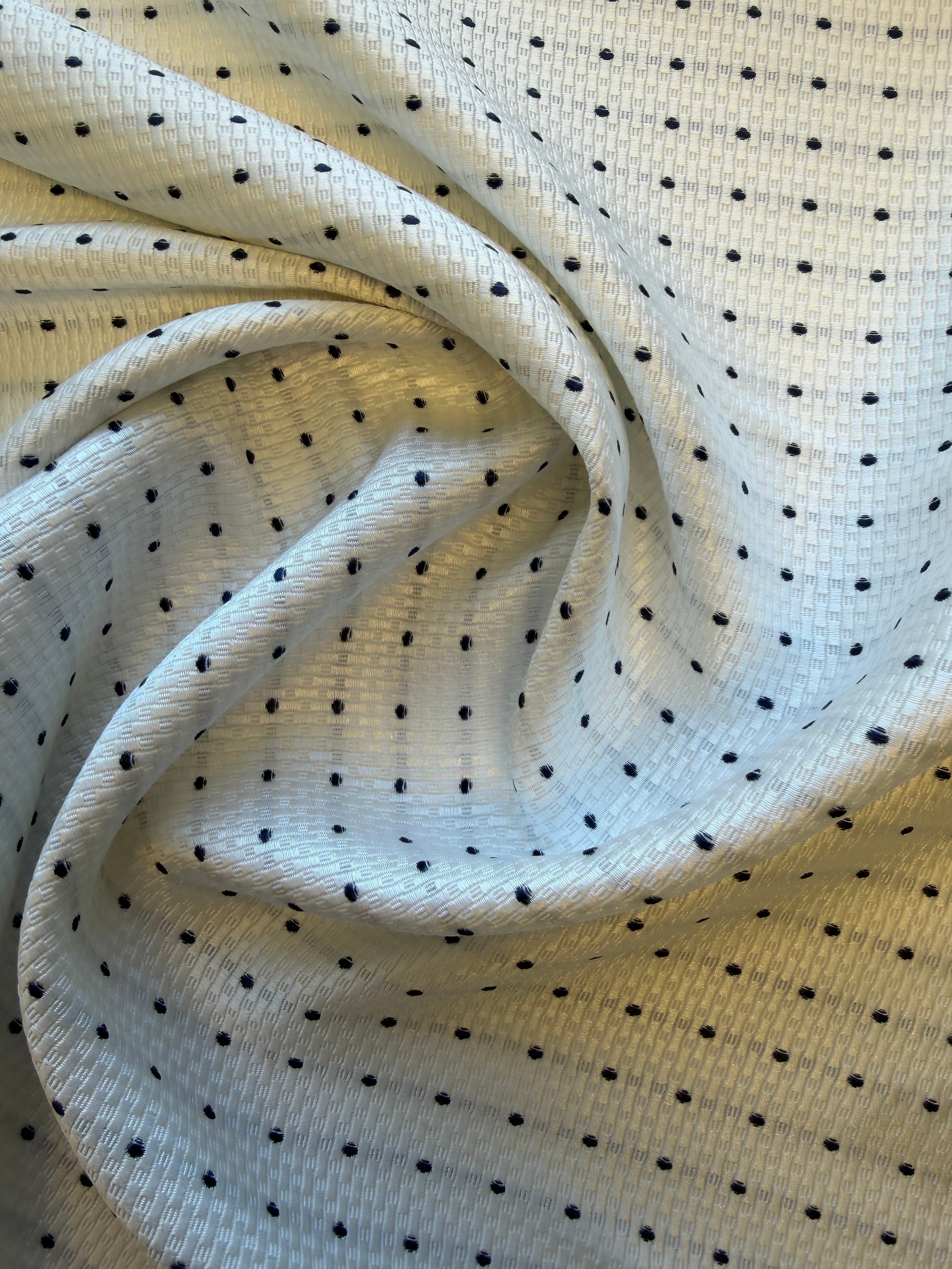 White Textured Woven Fabric with Navy Spot – 130 cm Wide