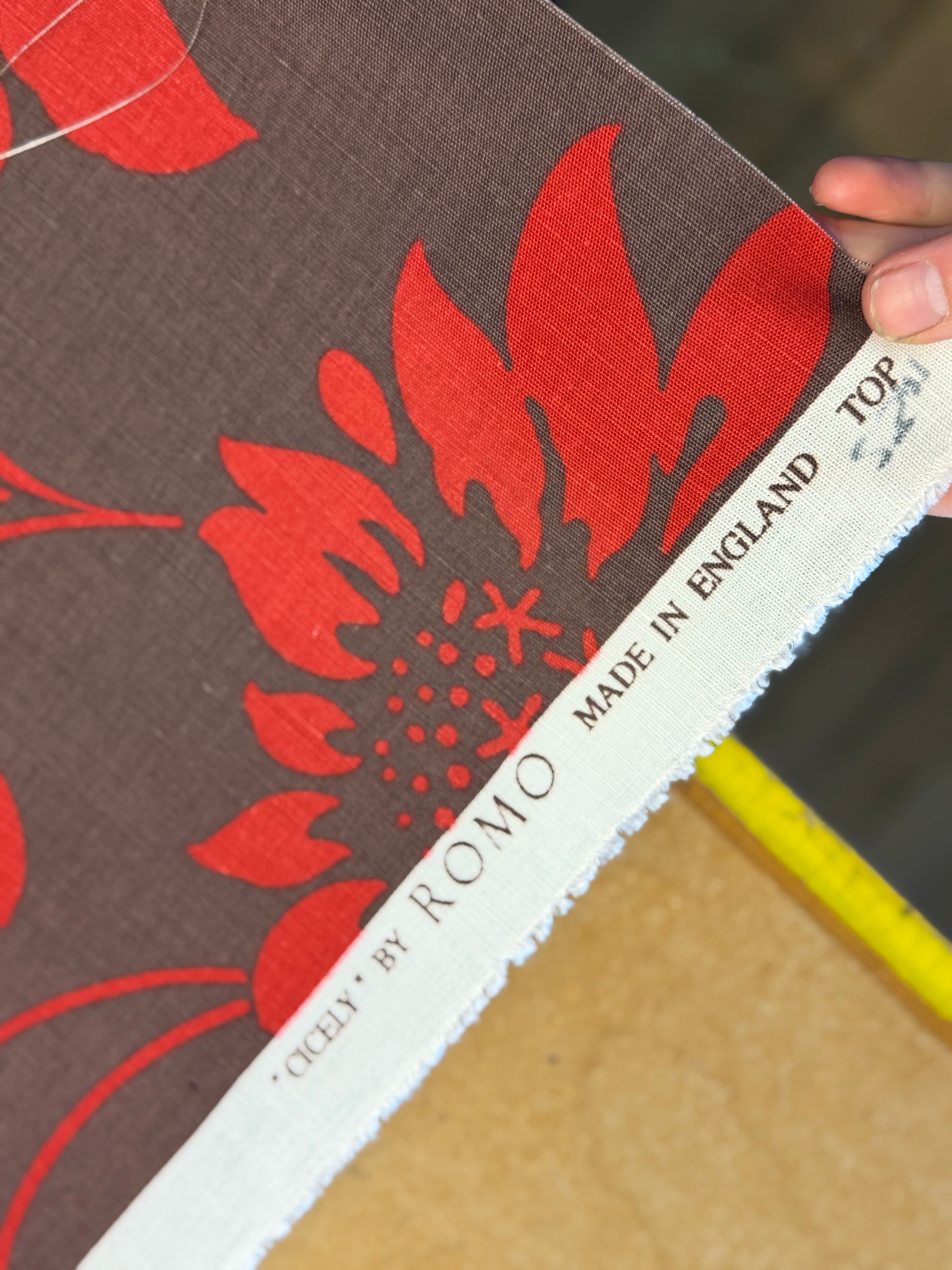 Cicely Furnishing Fabric by Romo – Brown with Red Design