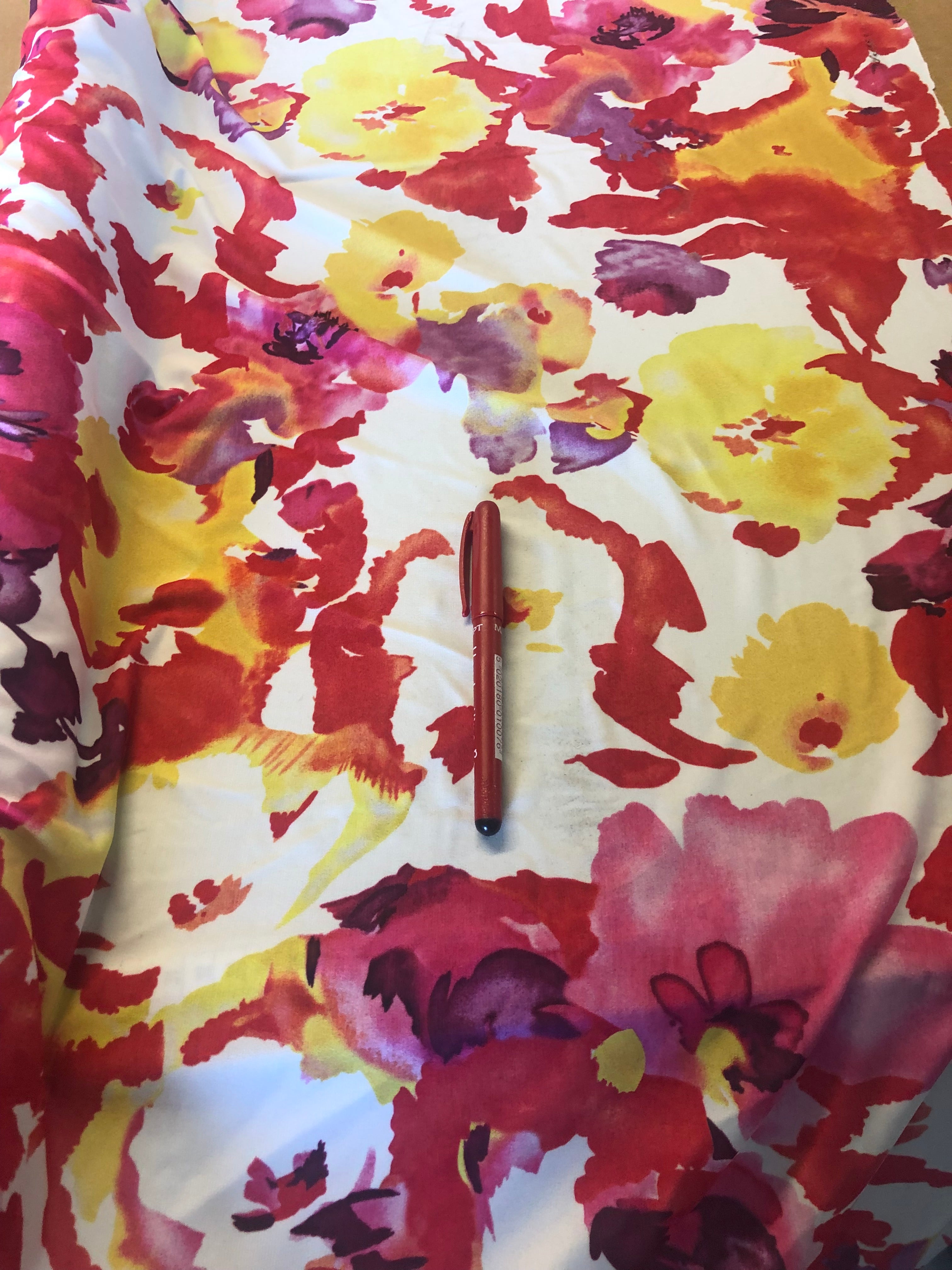 Yellow/Red Floral on Jersey. 220g/m2, 95%Polyester 5% Elastane. Roll Size: 1.9m