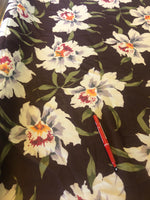 Floral on Brown Chiffon. 80gm2, 100% Polyester. Roll Size: 2m