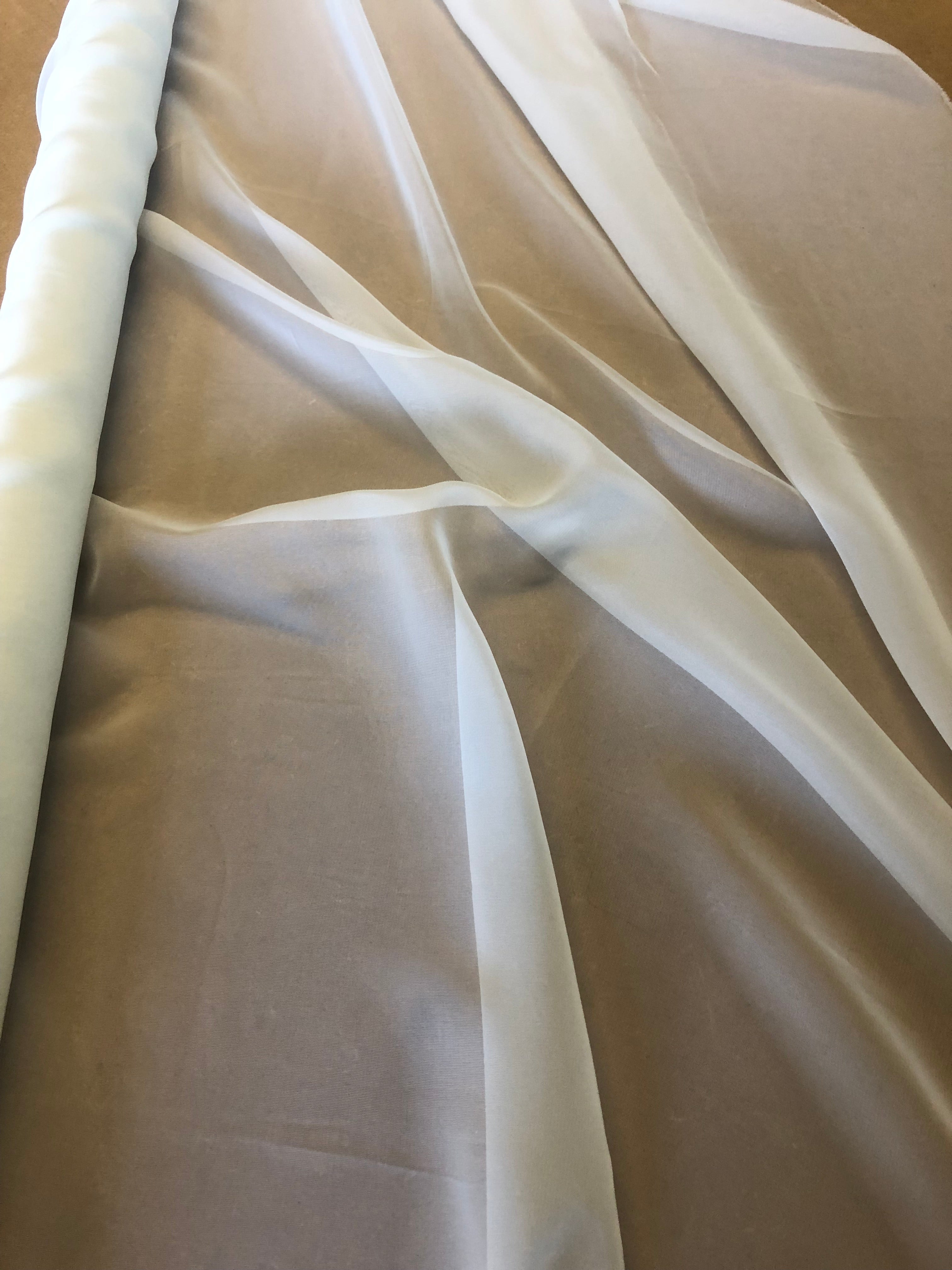 Ivory Flyaway Chiffon. 50g/m2, 100% Polyester. Roll Size: 2.7m