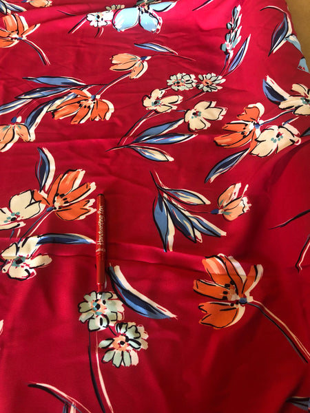 Floral Bunches on Red Crepe. 140g/m2, 100% Polyester. Roll Size: 5m