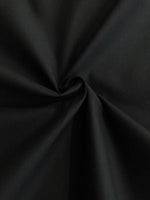 Black Stretch Cotton. 185g/m2, 140cm wide, 97% Cotton 3% Elastane. Roll Size - 1.4m