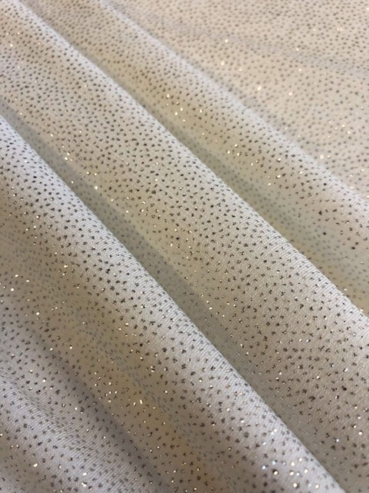 Ivory Glitter on Jersey – 148 cm Wide