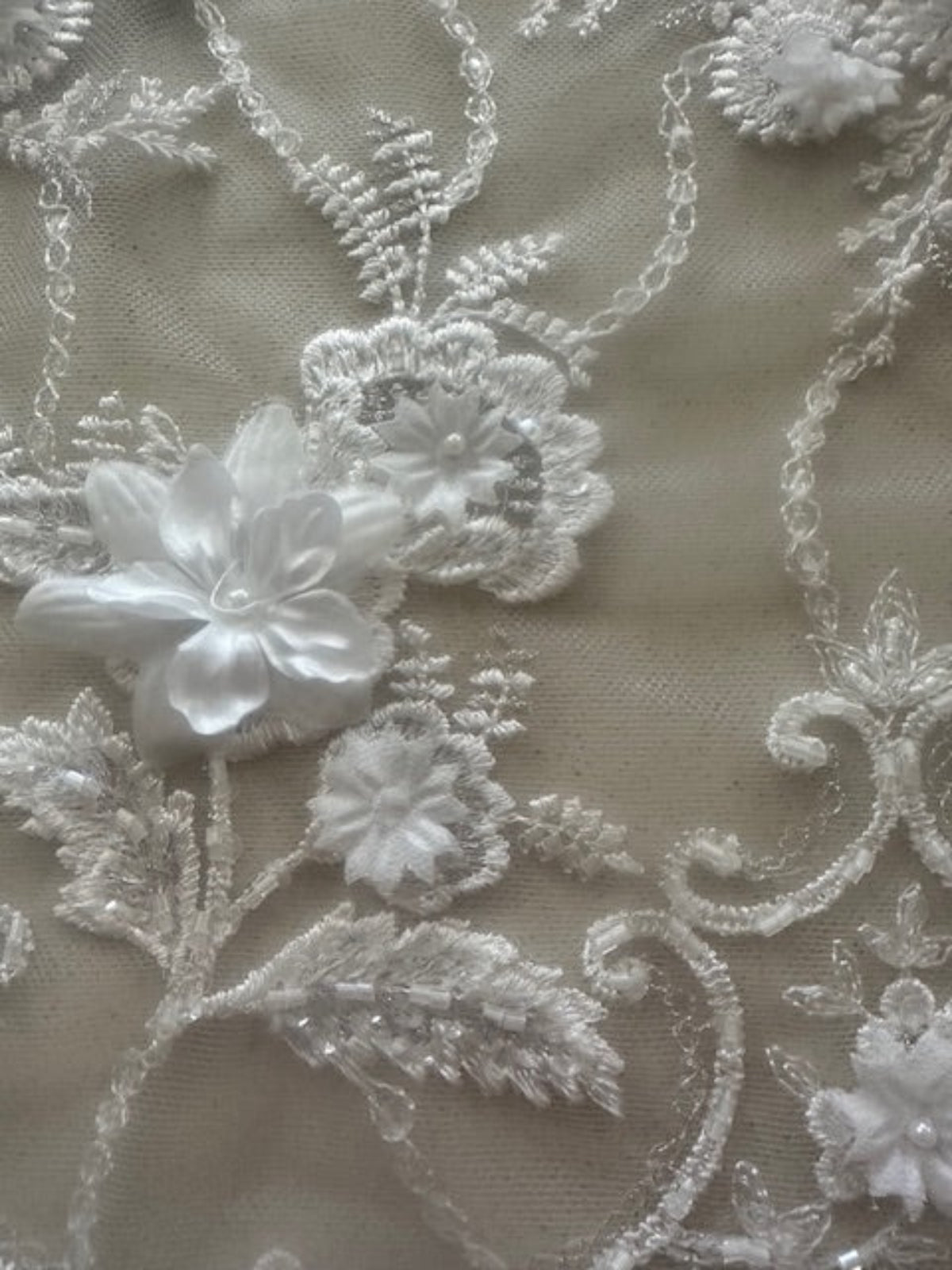 Ivory Trailing Laser cut Floral with Pearl Detail on Tulle