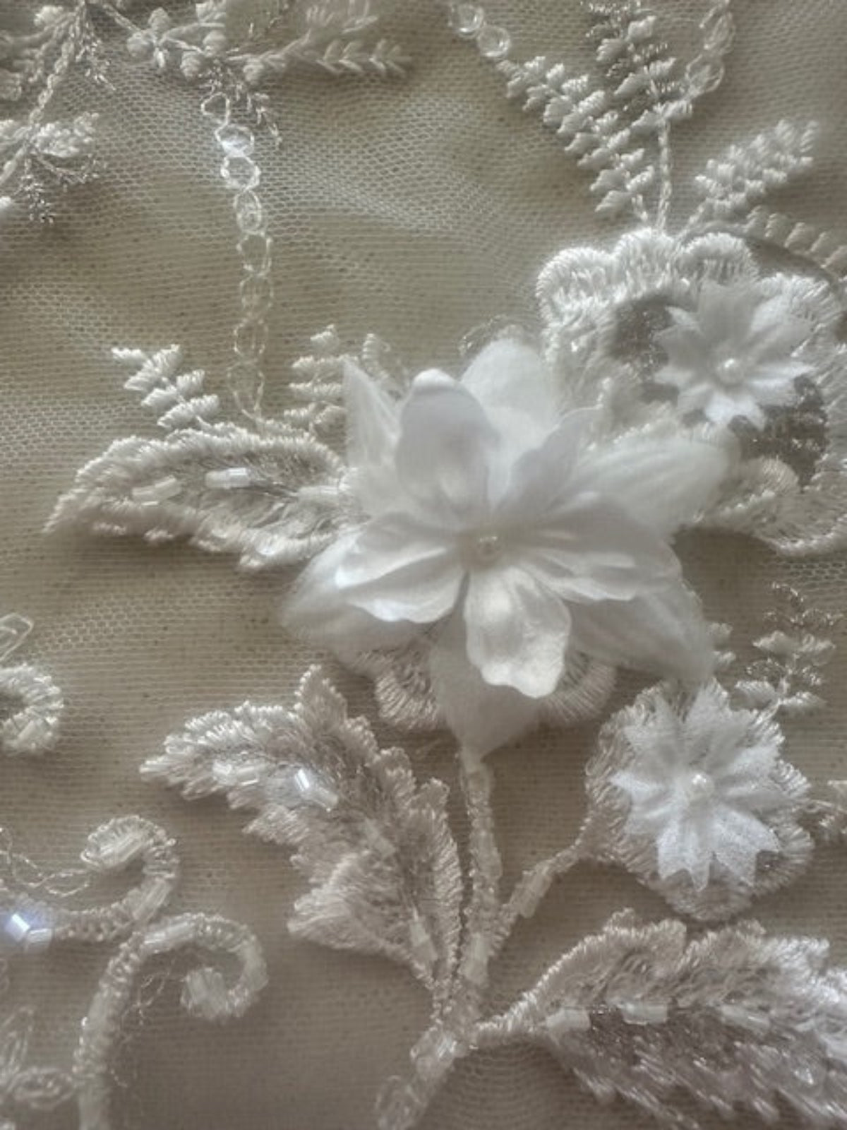 Ivory Trailing Laser cut Floral with Pearl Detail on Tulle