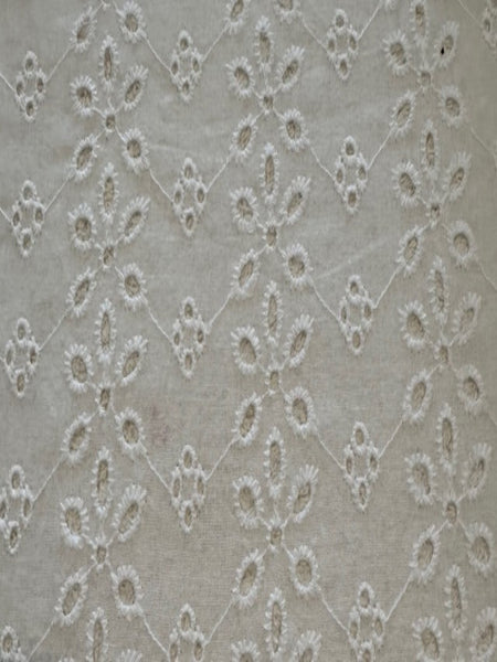 White Daisy Broderie Anglaise Running Along the Fabric