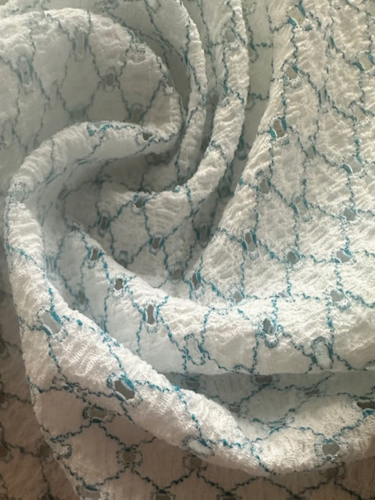 Turquoise Trellis with Stretch. Airtex Fabric