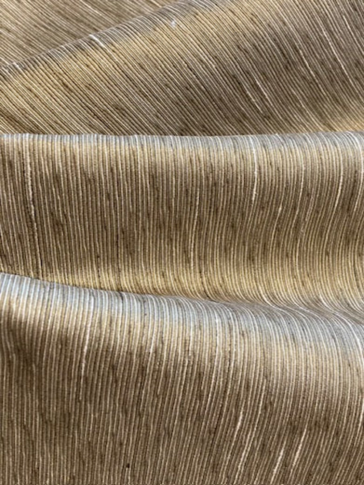 Khaki Slubbed & Semi Plain with Directional Weave. Crisp Handle