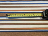 Bronze &amp; Blue Woven Stripe with Lurex Detail. One Way Stretch. Stripes run across the fabric.