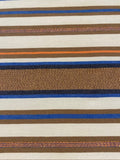 Bronze &amp; Blue Woven Stripe with Lurex Detail. One Way Stretch. Stripes run across the fabric.