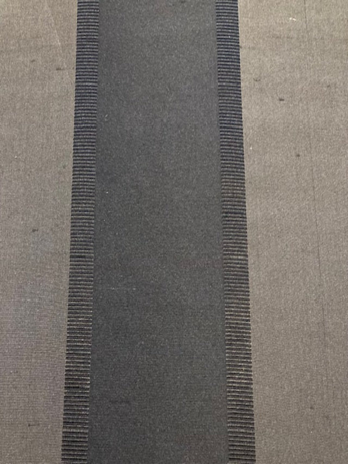 Black/Grey Silk Dupion Irridescent Stripe with Ribboned Stripe running along the Fabric