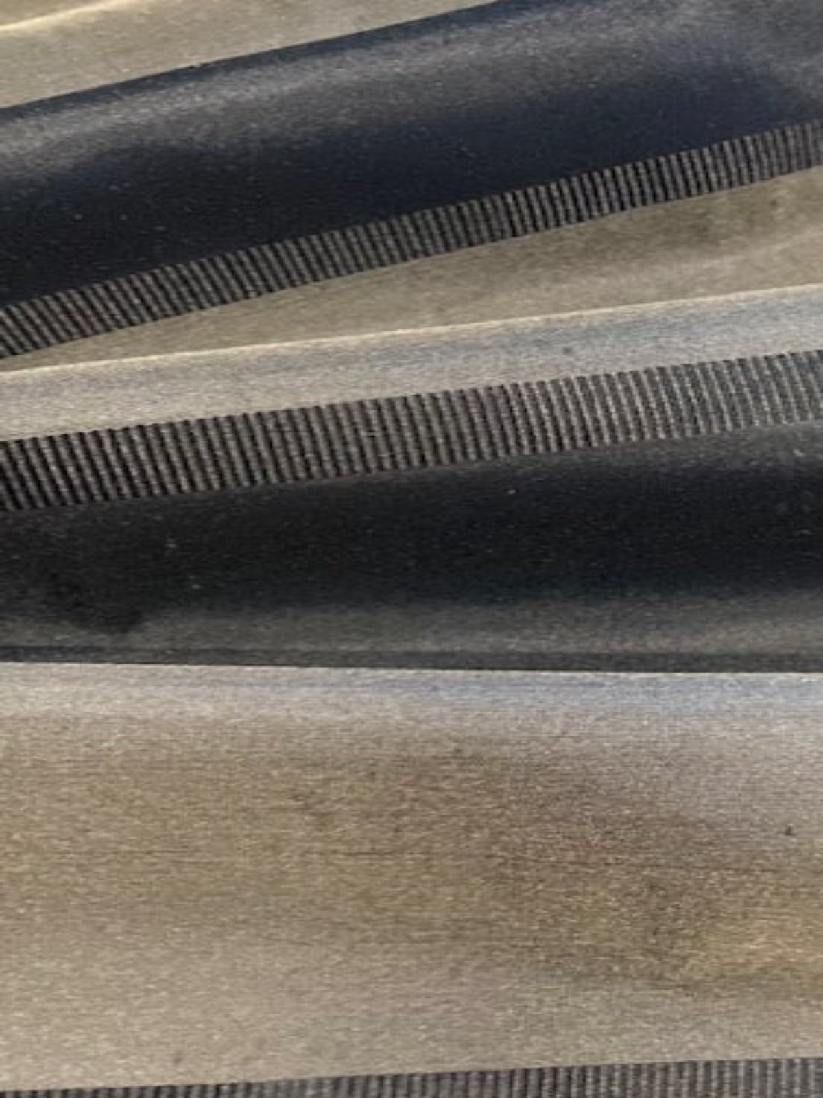 Black/Grey Silk Dupion Irridescent Stripe with Ribboned Stripe running along the Fabric