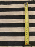 Black 2cm Stripe with Allover Gold Glitter Lurex Effect. Stripes run across the fabric.