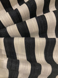 Black 2cm Stripe with Allover Gold Glitter Lurex Effect. Stripes run across the fabric.