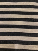 Black 8mm Stripe with Allover Gold Glitter Lurex Effect. Stripes run across the fabric.