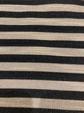 Black 8mm Stripe with Allover Gold Glitter Lurex Effect. Stripes run across the fabric.