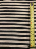 Black 8mm Stripe with Allover Gold Glitter Lurex Effect. Stripes run across the fabric.