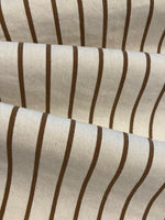 Bronze Lurex Stripe with Self Coloured Lurex detail.on Ivory Stripes run across the fabric.