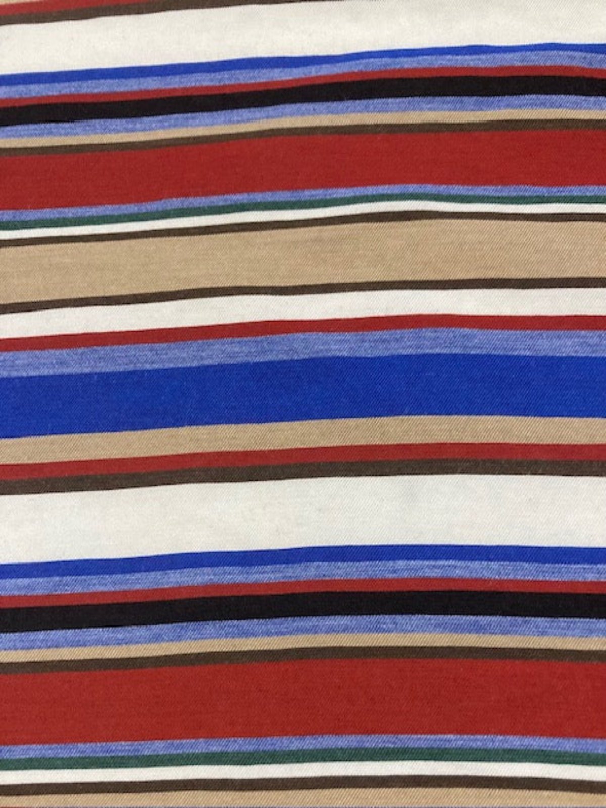 Blue/Red/Coffee Woven Cotton lightweight Stripe. Stripes run across the fabric.