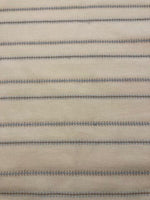 Blue/Burnt Orange Woven Fish Bone Stripe on Ivory. Stripes run across the Fabric.